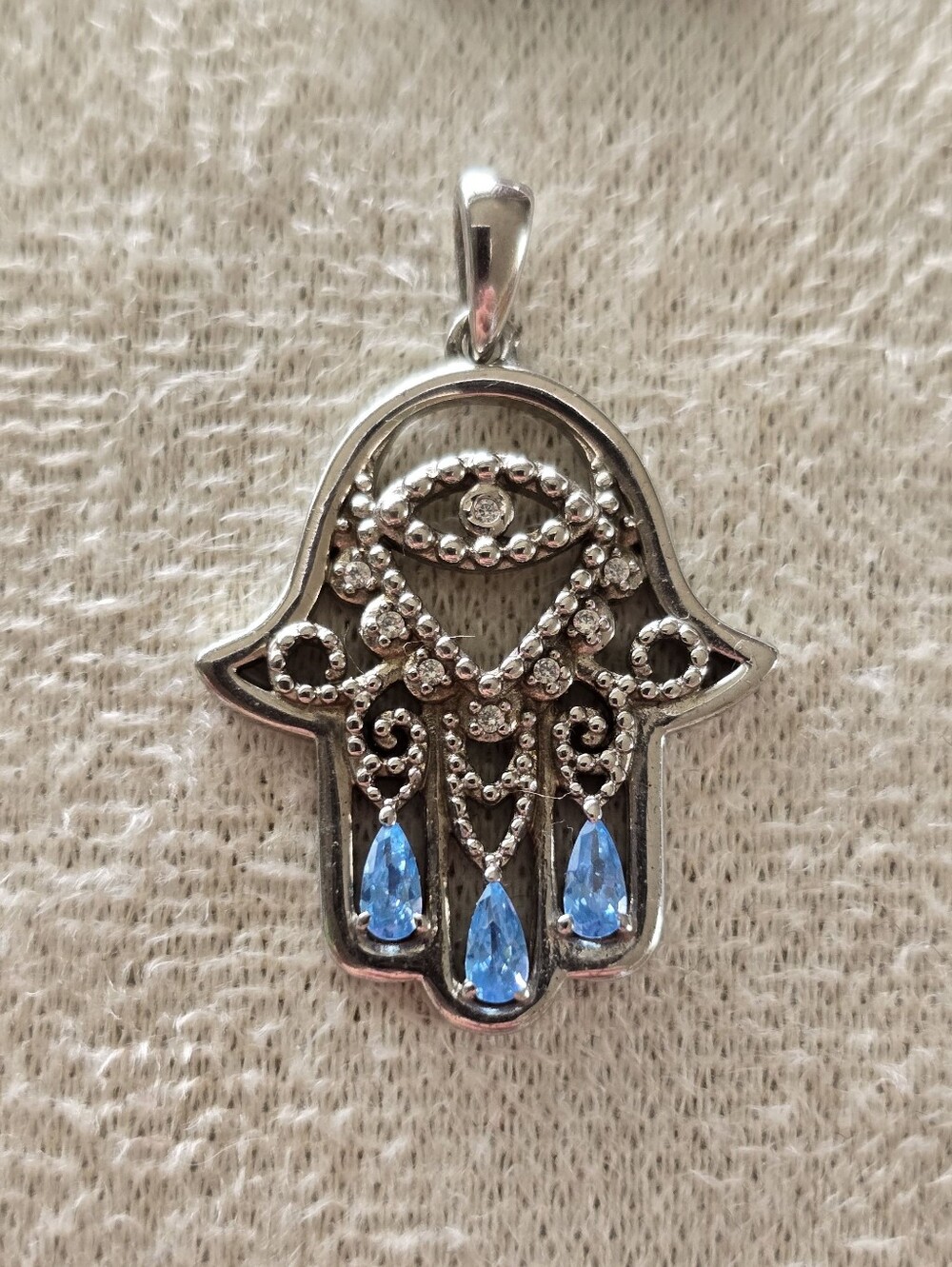 Sterling Silver Hamsa Pendant with Blue Teardrop Stones